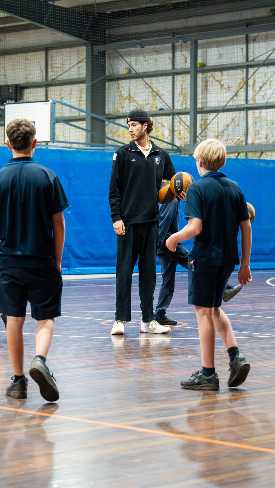 Coach working with a small group of students